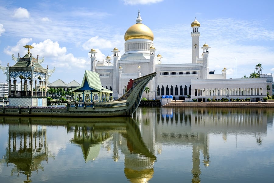 Water reflection and boat at the Sultan Omar Ali Saifuddien Mosque in Brunei