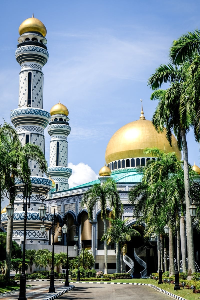 Palm trees and prayer towers at the Jame'Asr Hassanil Bolkiah mosque in Brunei