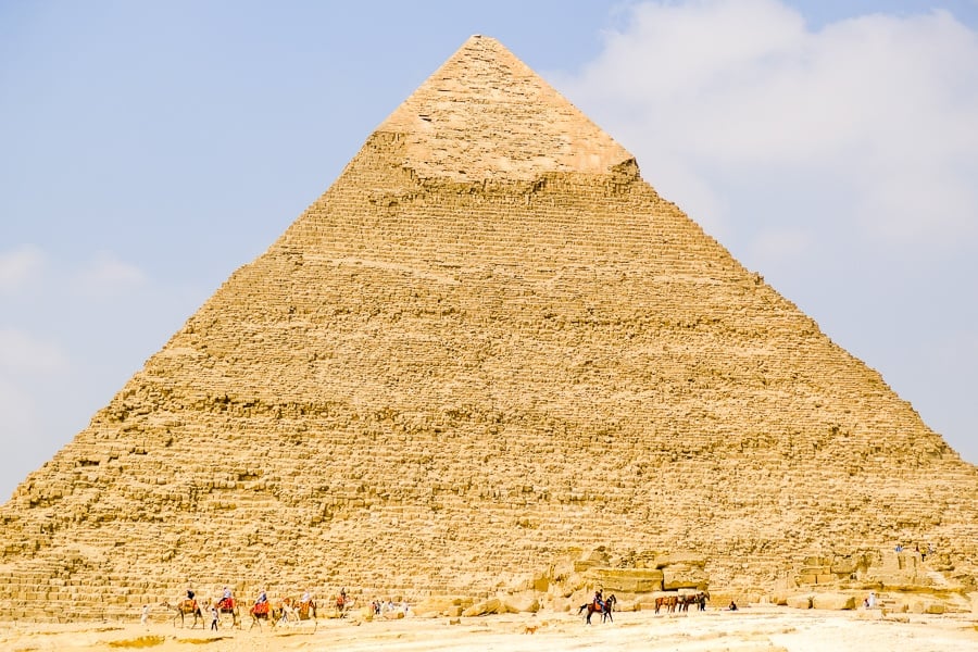 Tiny camels near the Great Pyramids of Giza in Egypt