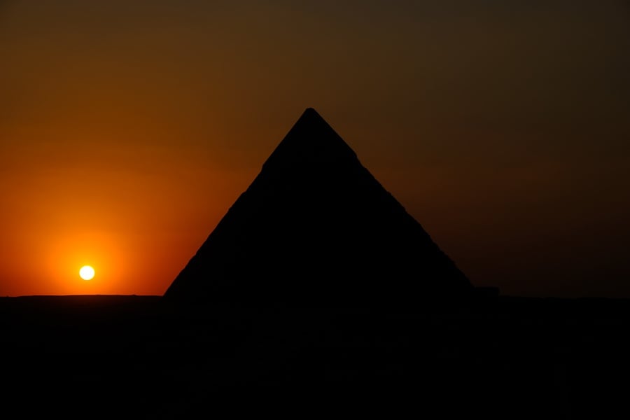 Sunset at night by the Great Pyramids of Giza in Egypt