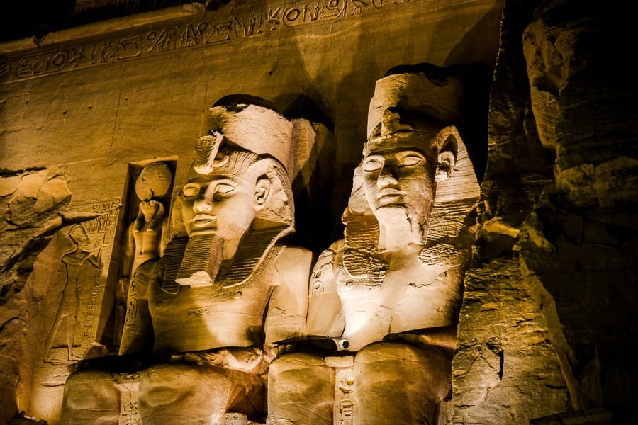 Abu Simbel Temple pharaoh statues lit up at night in Egypt