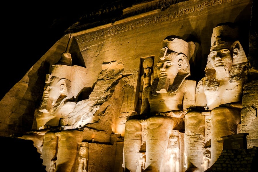 Abu Simbel Temple pharaoh statues lit up at night in Egypt