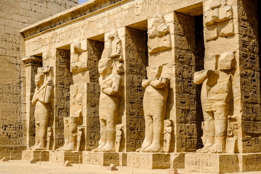 Pharaoh statues at Medinet Habu Temple in Egypt