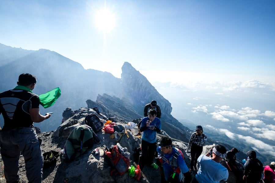 Hikers at the Mount Agung volcano crater in Bali