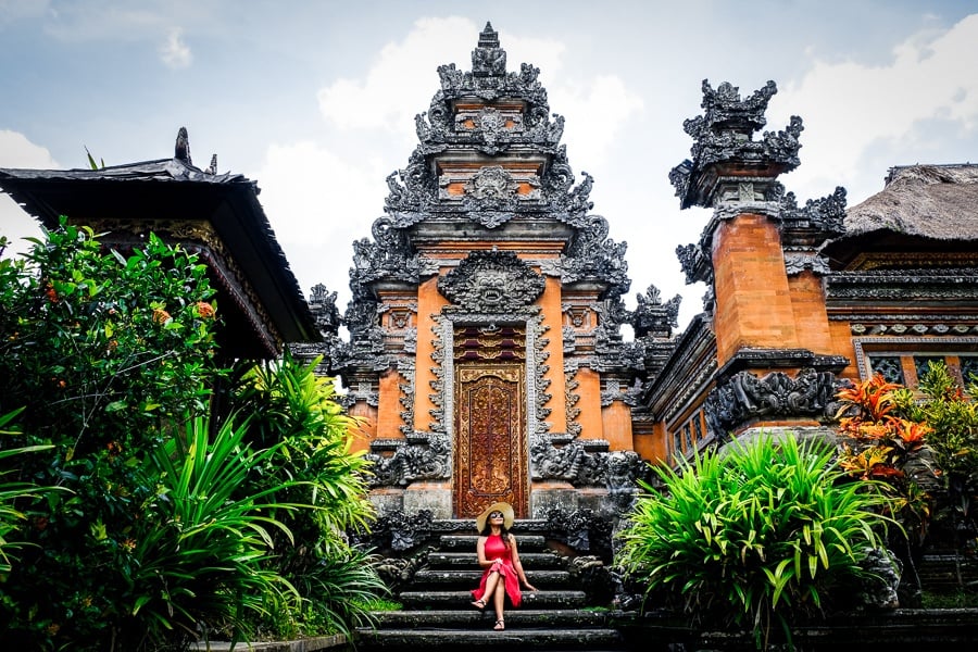 My woman at the doorway of Pura Saraswati Temple in Ubud Bali