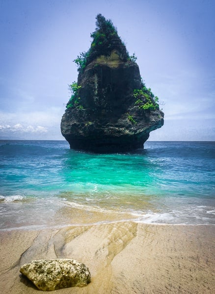 Pointy rock and sand at Suwehan Beach in Nusa Penida, Bali