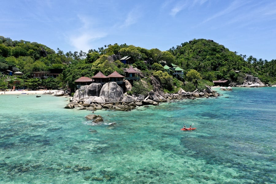 Drone view of kayakers at Taa Toh Beach & Bay in Koh Tao, Thailand