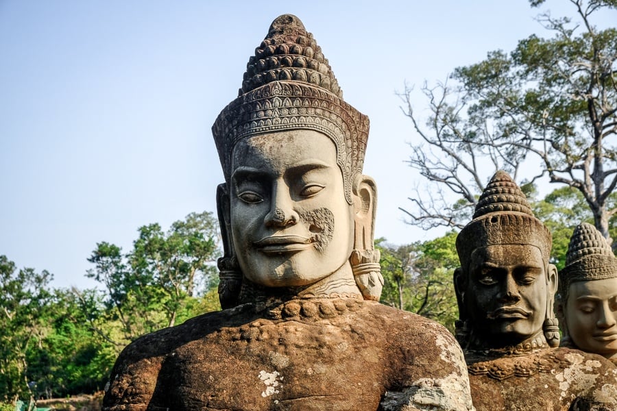 Stone figures on the bridge to Angkor Thom gate