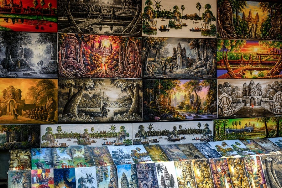 Paintings for sale at the river market in Siem Reap Cambodia